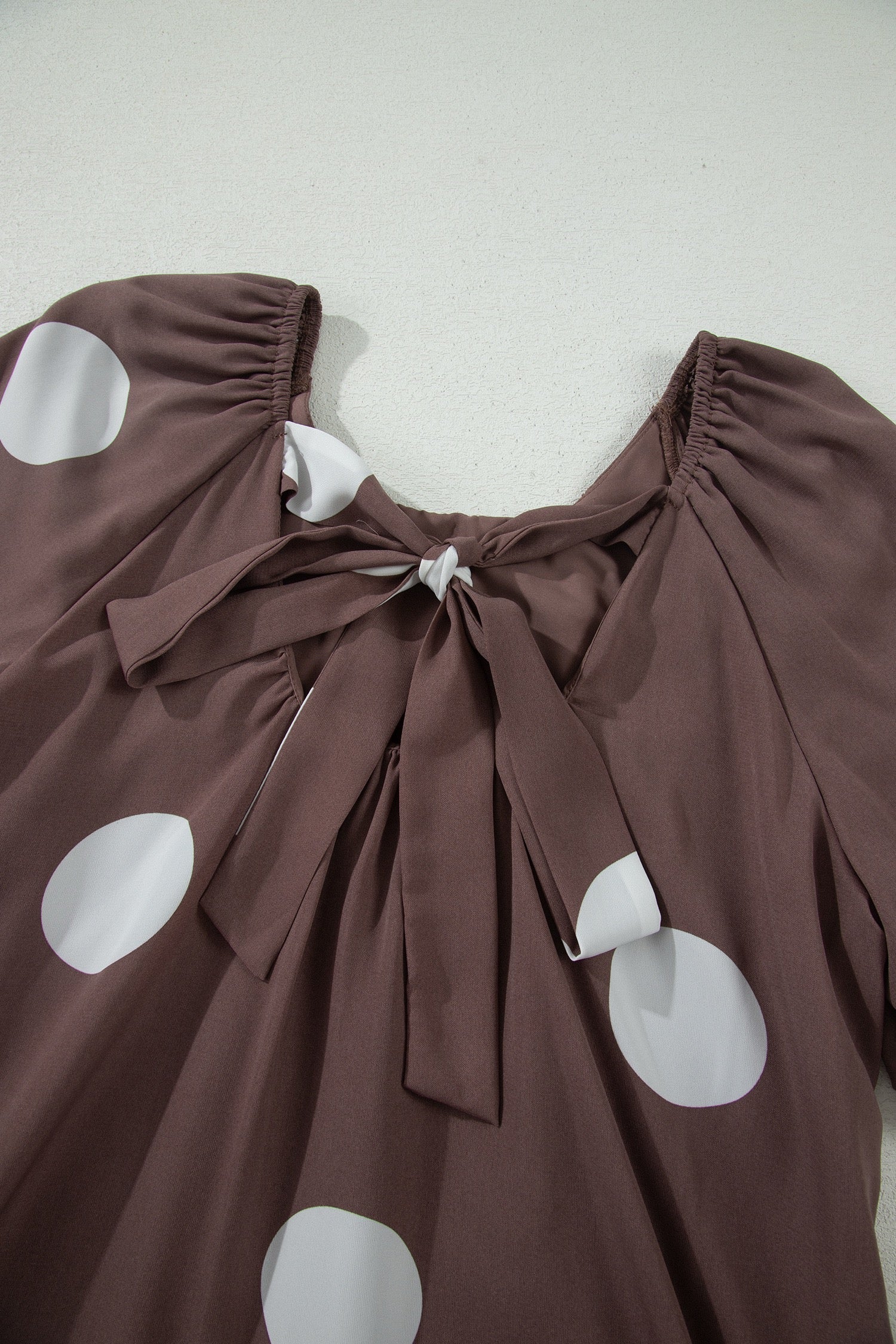Dotty for You — Knot-Back Puff Sleeve Mini Dress