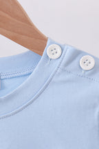 Blue puppy clover embroidery top